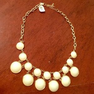 Gold necklace with ivory circles