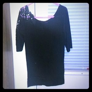 Long sleeve shirt with lace on one sleeve