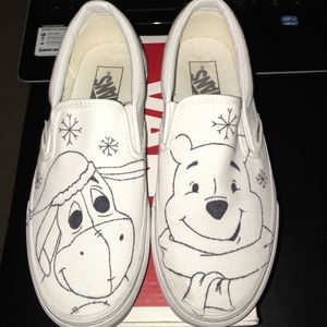White vans with Winnie the Pooh design