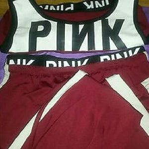 (HOLDING))Vs pink letter sports bra and sweatpants