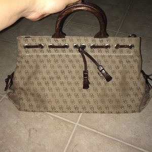 Dooney & Bourke anniversary Signature Tassel