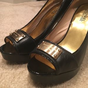 Black Leather Michael Kors Heels with Logo Plate