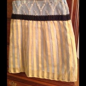 Skirt of vintage fabrics make this one of a kind!