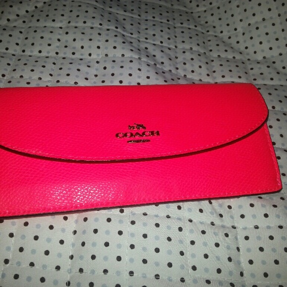 Neon pink Coach wallet
