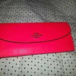 Neon pink Coach wallet