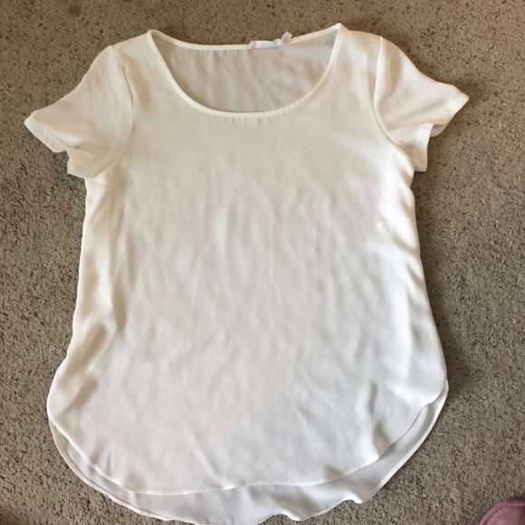 Sheer cream top.