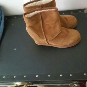 Hidden wedge cognac boots.