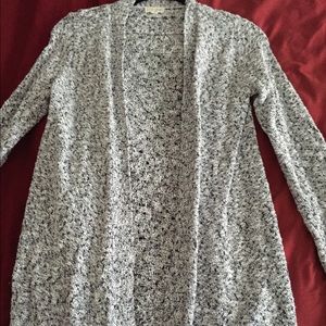 Open knit cardigan. Blue with specks of white.