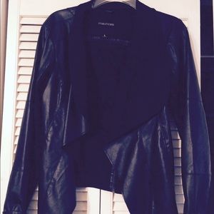 Black leather jacket (not real leather)
