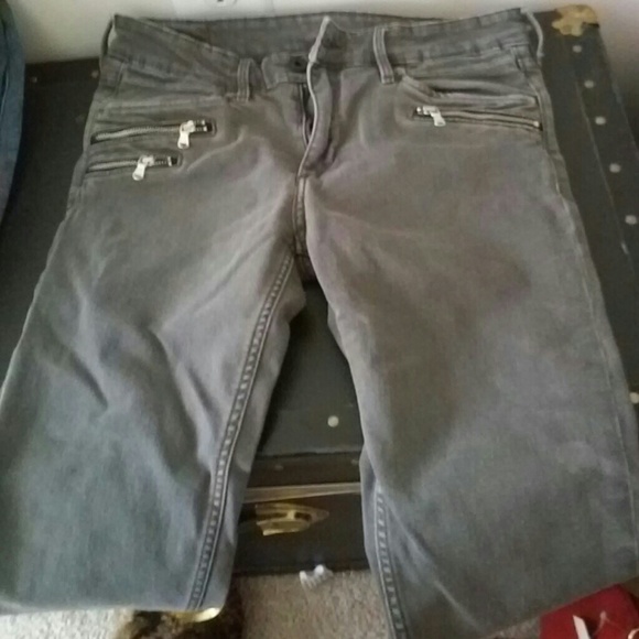 Grey moto jeans with zipper pockets.  H and M