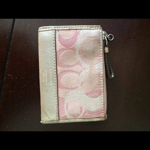 Pink and silver coach coin purse