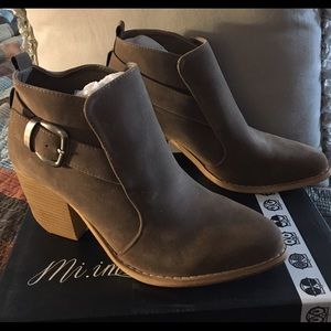 Brand new!! Never been worn. Side buckle bootie!