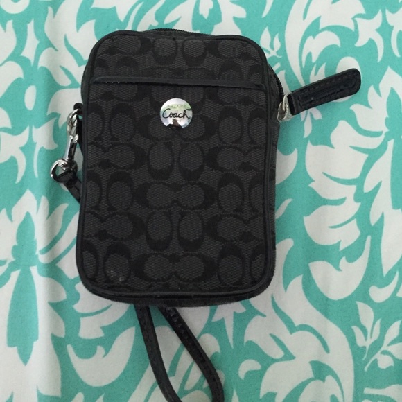 Black coach phone carrying case with strap
