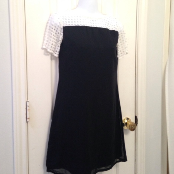 Mod lace and black polyester dress.