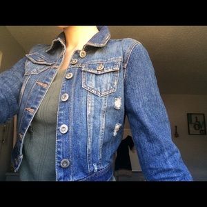 Distressed denim jacket