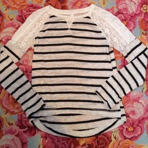 Black-and-white striped shirt with lace at the top