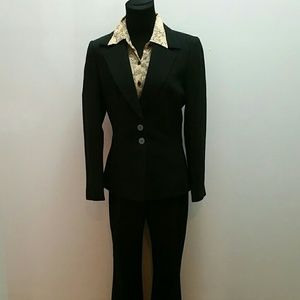 Black and white pinstripe Tahari power suit.
