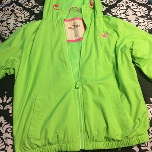Green Hollister wind-breaker/rain coat