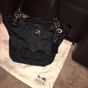 Coach black Jacquard signature "C" purse.