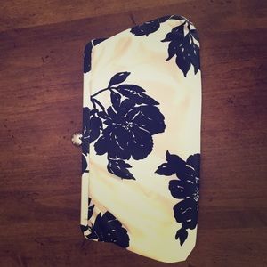 Clutch purse. Black and off-white floral.