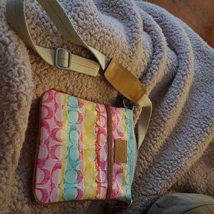 Blue, Yellow, and Pink coach purse
