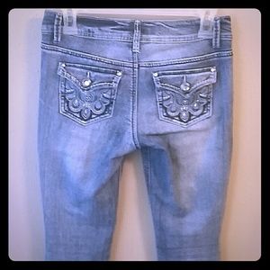 Low rise boot cut blue jeans size 3 embellish