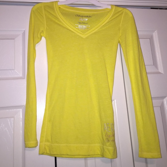 long sleeve yellow shirt.