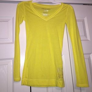 long sleeve yellow shirt.
