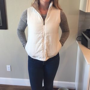 Reversible, gray/white zip-up vest