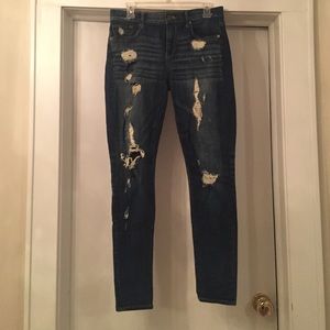 Destroyed medium wash denim jeans