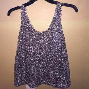 A gold sequence muscle shirt