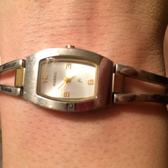 Gold and silver fossil watch. Slight wear