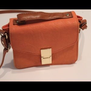 Contrast Handle Flat Lock Across Body/ Coral