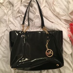 Black leather Michel Kors purse
