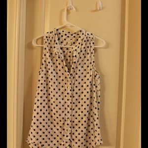Navy polka dot sleeveless top
