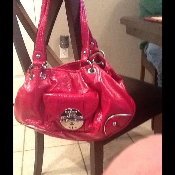 Kathy Van Zeeland Raspberry Pink handbag.  20% off