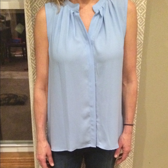 Light blue top. Collective Concepts