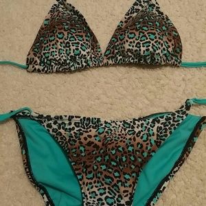 Leopard print with teal swimsuit