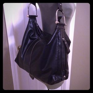 Rocker styling hobo bag