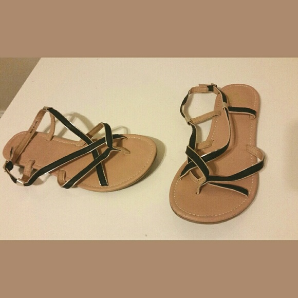 Black and gold strappy sandals.