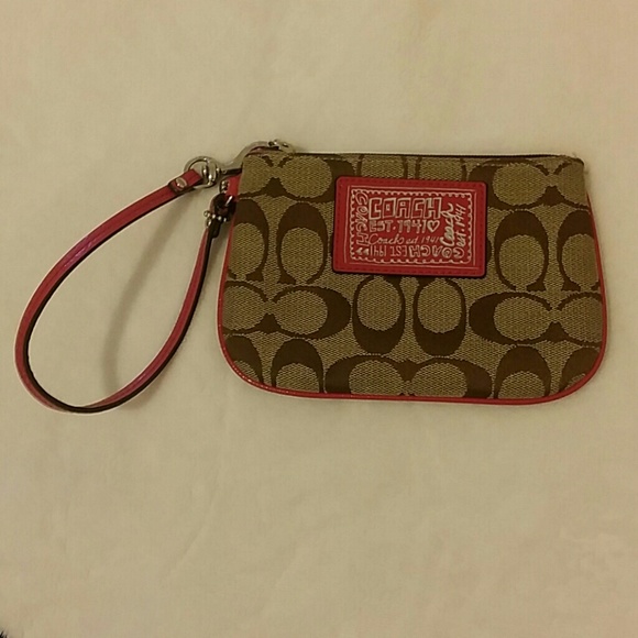 SOLD# Coach zip wristlet in signature fabric