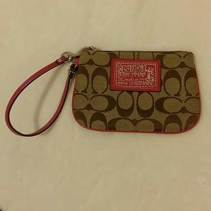 SOLD# Coach zip wristlet in signature fabric