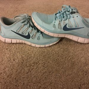Light blue Nike free runs