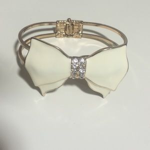 Ivory and gold bow bracelet