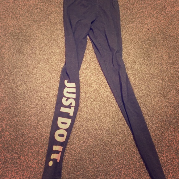 Grey and orange Nike tights