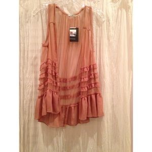 A light pink cardigan