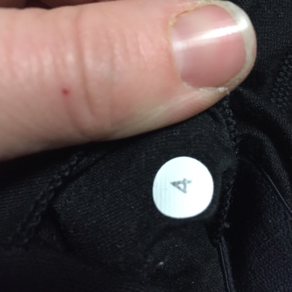 Lululemon black size four workout tank very cute. - Picture 3 of 3