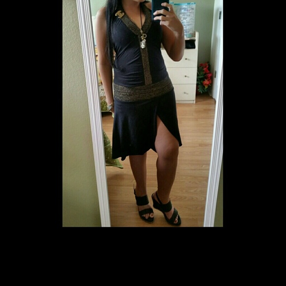 Black and gold dress with slit size small/medium