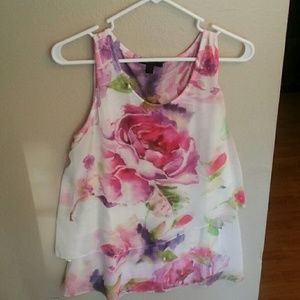 Very cute and flirty sleeveless top.