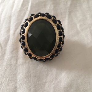 Costume jewelry ring black, slate stone and gold.